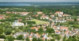 Luftaufnahme einer Stadt, visualisiert als Teil eines Investmentvideos fuer BEECH Resort