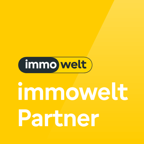 Ein gelber Hintergrund mit weißem Text, der 'immo welt', 'immowelt' und 'Partner' sagt. Ein Poster ist ebenfalls sichtbar.